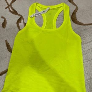 Highlight yellow swiftly tech racer back